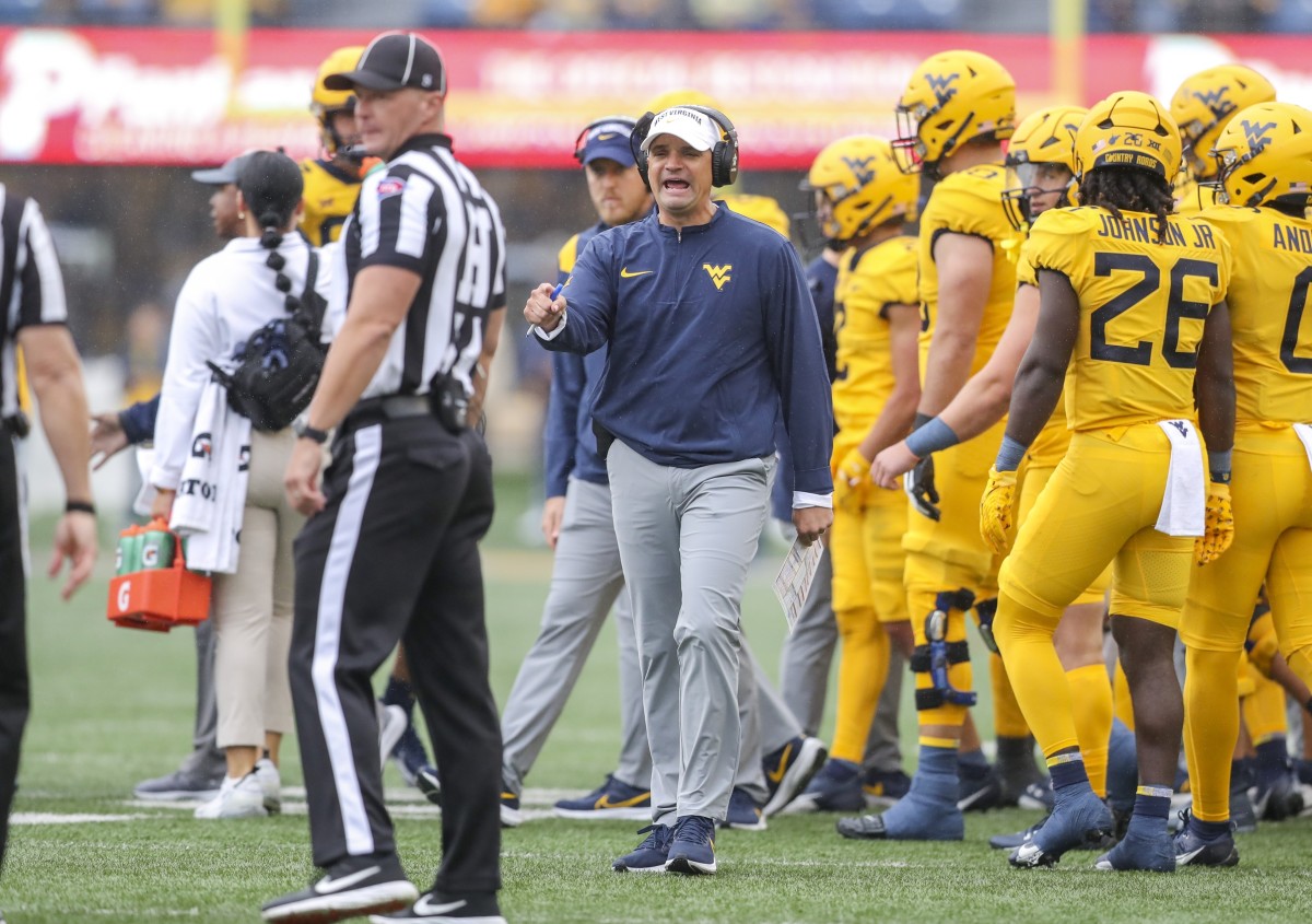 Sep 23, 2023; Morgantown, West Virginia, USA; West Virginia Mountaineers head coach Neal Brown argues a call during the first quarter against the Texas Tech Red Raiders at Mountaineer Field at Milan Puskar Stadium. Mandatory Credit: Ben Queen-USA TODAY Sports