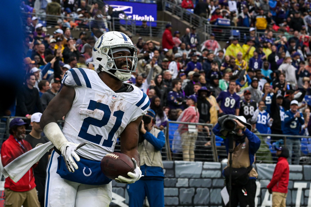Sep 24, 2023; Baltimore, Maryland, USA; Indianapolis Colts running back Zack Moss (21) reacts after scoring a touchdown during the game against the Baltimore Ravens at M&T Bank Stadium. Mandatory Credit: Tommy Gilligan-USA TODAY Sports