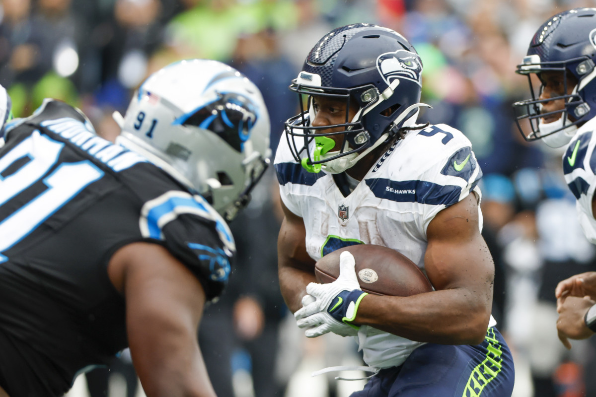 Seattle Seahawks running back Kenneth Walker III (9) rushes for a touchdown against the Carolina Panthers during the third quarter at Lumen Field.