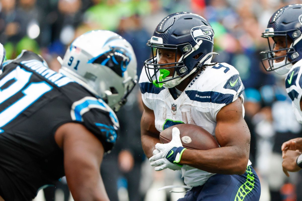 Seattle Seahawks running back Kenneth Walker III (9) rushes for a touchdown against the Carolina Panthers during the third quarter at Lumen Field.