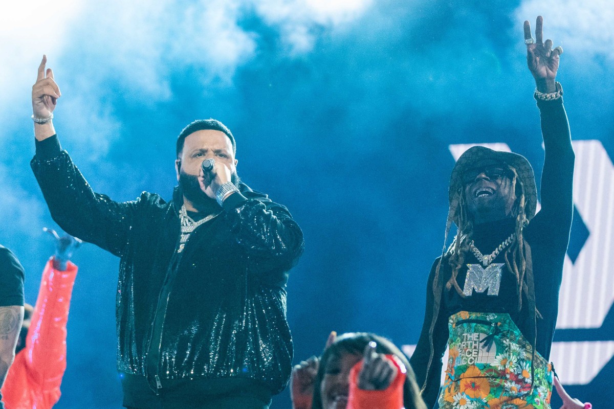 , DJ Khaled (center), and Lil Wayne (right) during the 2022 NBA All-Star Saturday Night at Rocket Mortgage Field House
