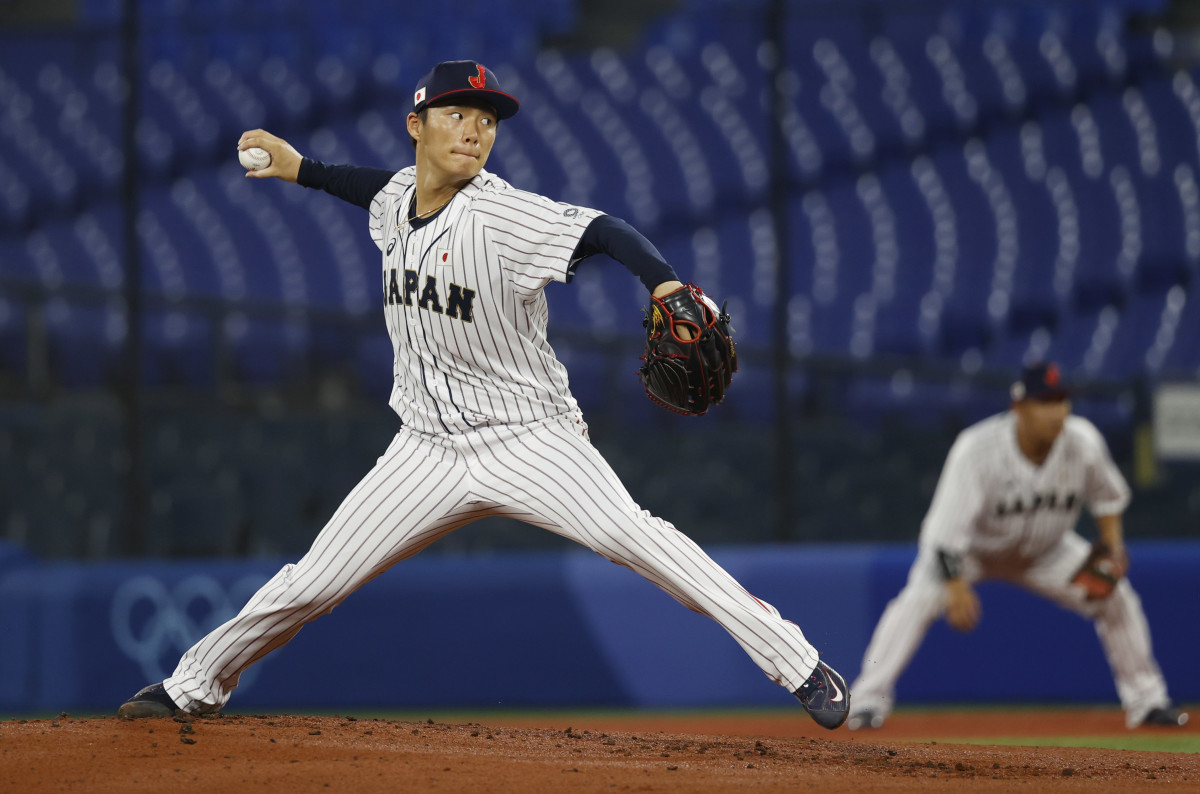 Team Japan pitcher Yoshinobu Yamamoto throws a pitch against Korea in a baseball semifinal match during the Tokyo 2020 Olympic Summer Games at Yokohama Baseball Stadium. (2021)