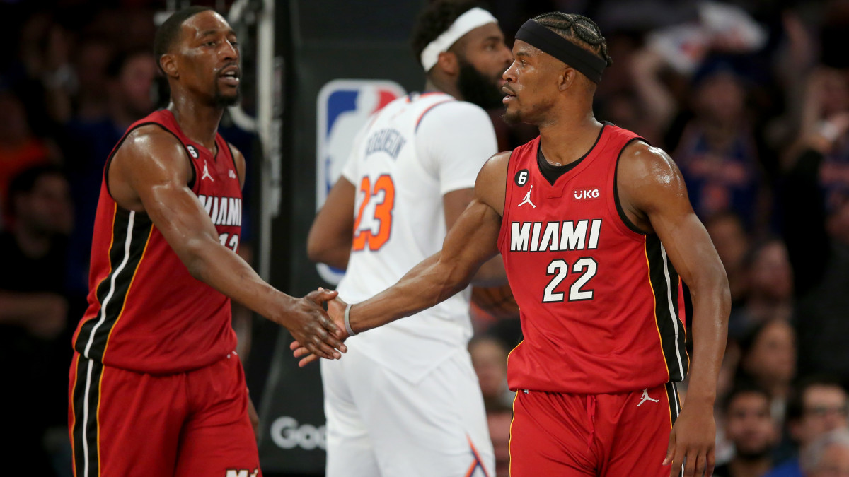 Miami Heat center Bam Adebayo and Miami Heat forward Jimmy Butler.