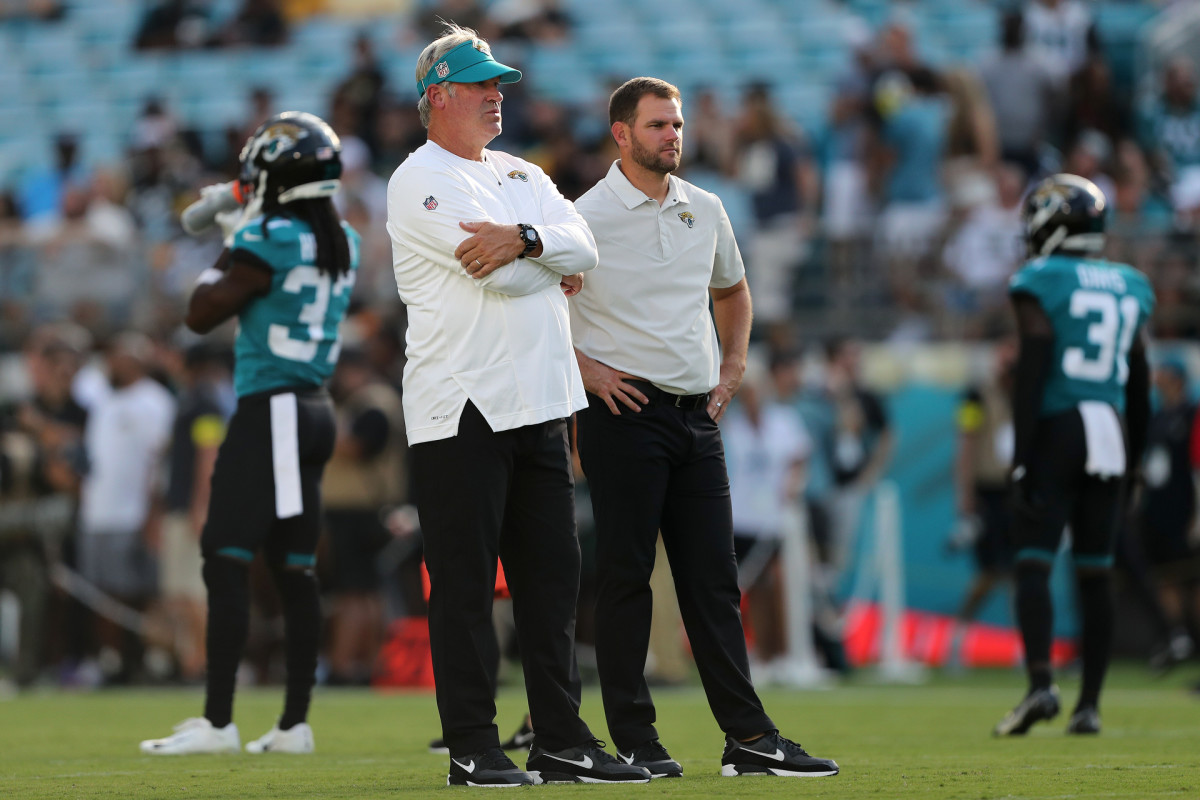 Jaguars head coach Doug Peterson and offensive coordinator Press Taylor look on before the game against the Steelers