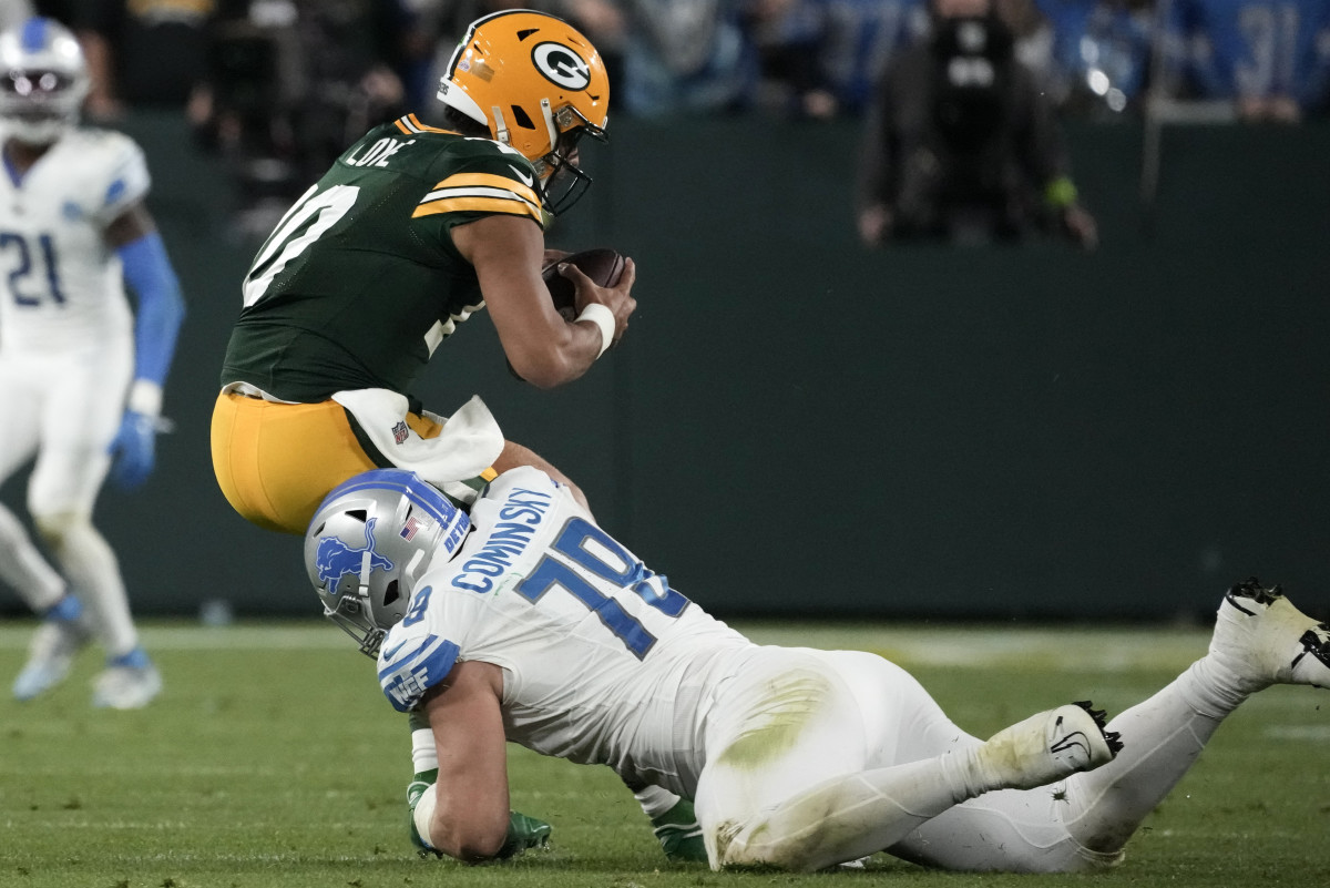 Packers quarterback Jordan Love is sacked by Lions defensive end John Cominsky
