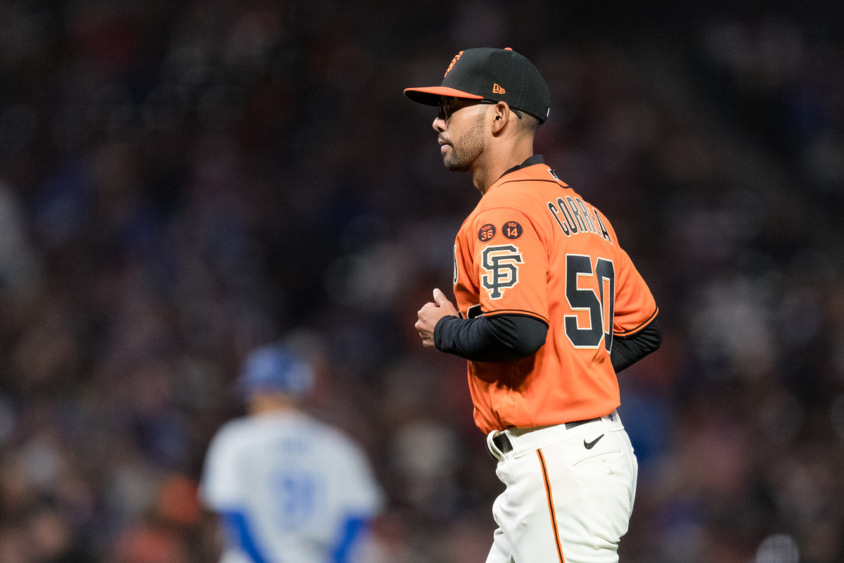 Sep 29, 2023; San Francisco, California, USA; San Francisco Giants interim manager Kai Correa (50) returns to the dugout after living starting pitcher Keaton Winn (67) during the sixth inning of the game against the Los Angeles Dodgers at Oracle Park.