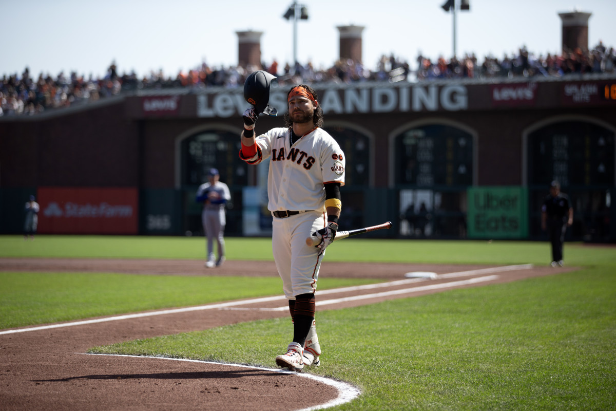 SF Giants shortstop Brandon Crawford acknowledges the cheers of the crowd as he comes to bat against the Los Angeles Dodgers during the first inning at Oracle Park on October 1, 2023.