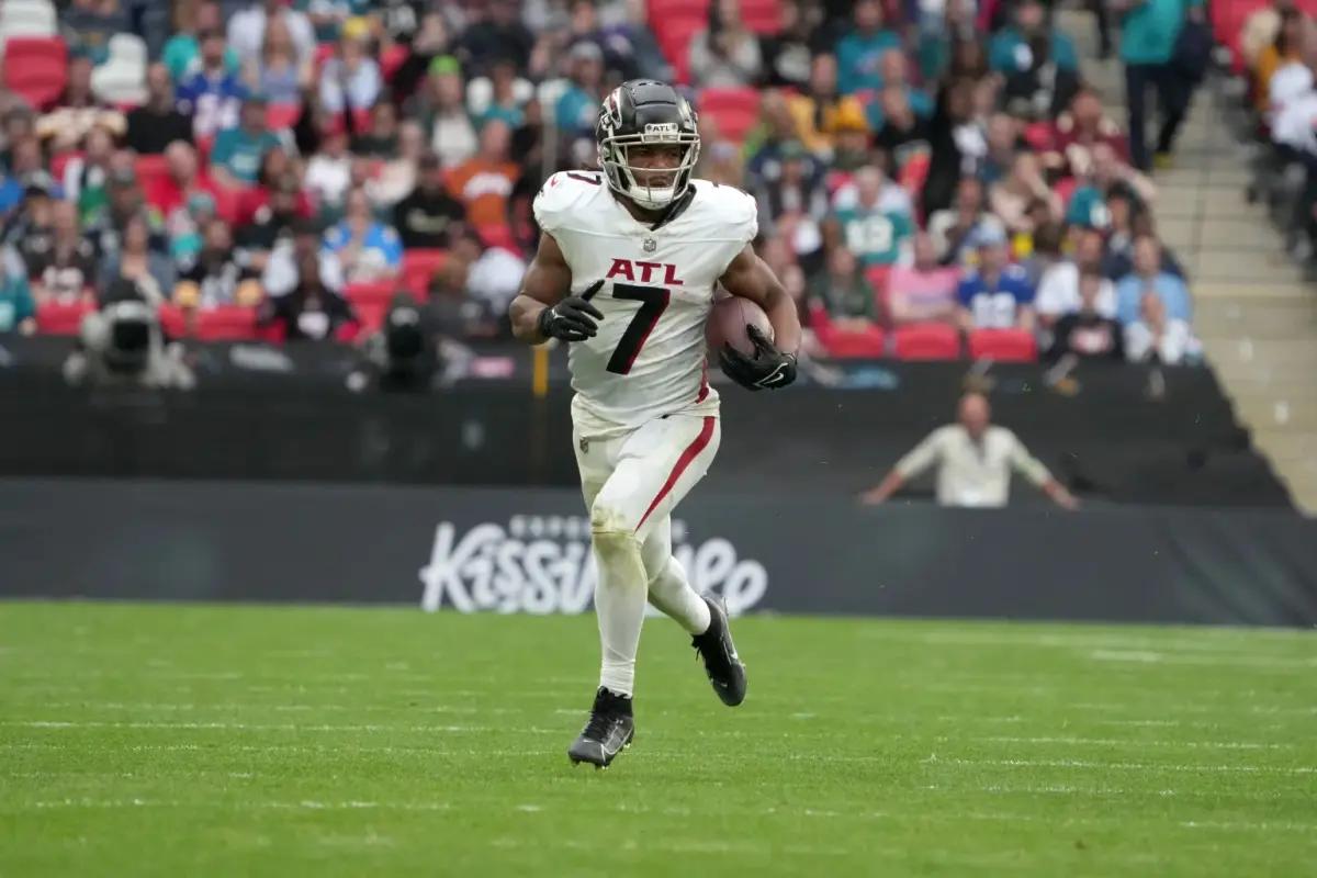 Oct 1, 2023; London, United Kingdom; Atlanta Falcons running back Bijan Robinson (7) carries the ball against the Jacksonville Jaguars in the second half during an NFL International Series game at Wembley Stadium.