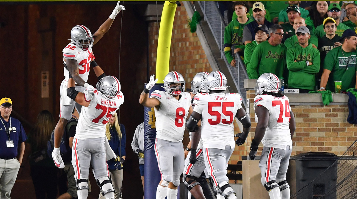 Ohio State players celebrate a touchdown against Notre Dame