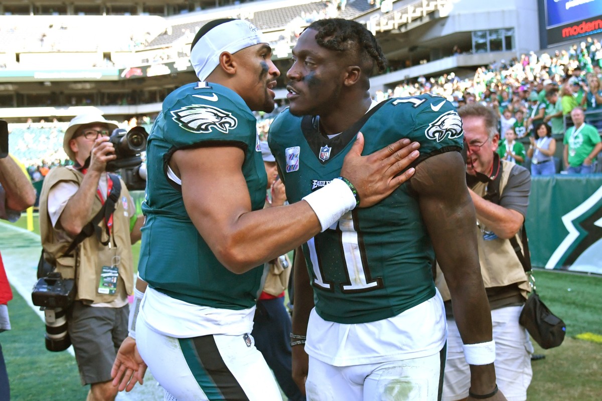 Eagles quarterback Jalen Hurts threw for 319 yards and two touchdown passes to A.J. Brown, who had nine catches for 175 yards in Philadlephia's overtime win over the Commanders in Week 4.