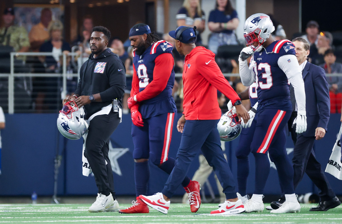New England Patriots linebacker Matthew Judon (9) walks off the field injured during the second half against the Dallas Cowboys at AT&T Stadium.