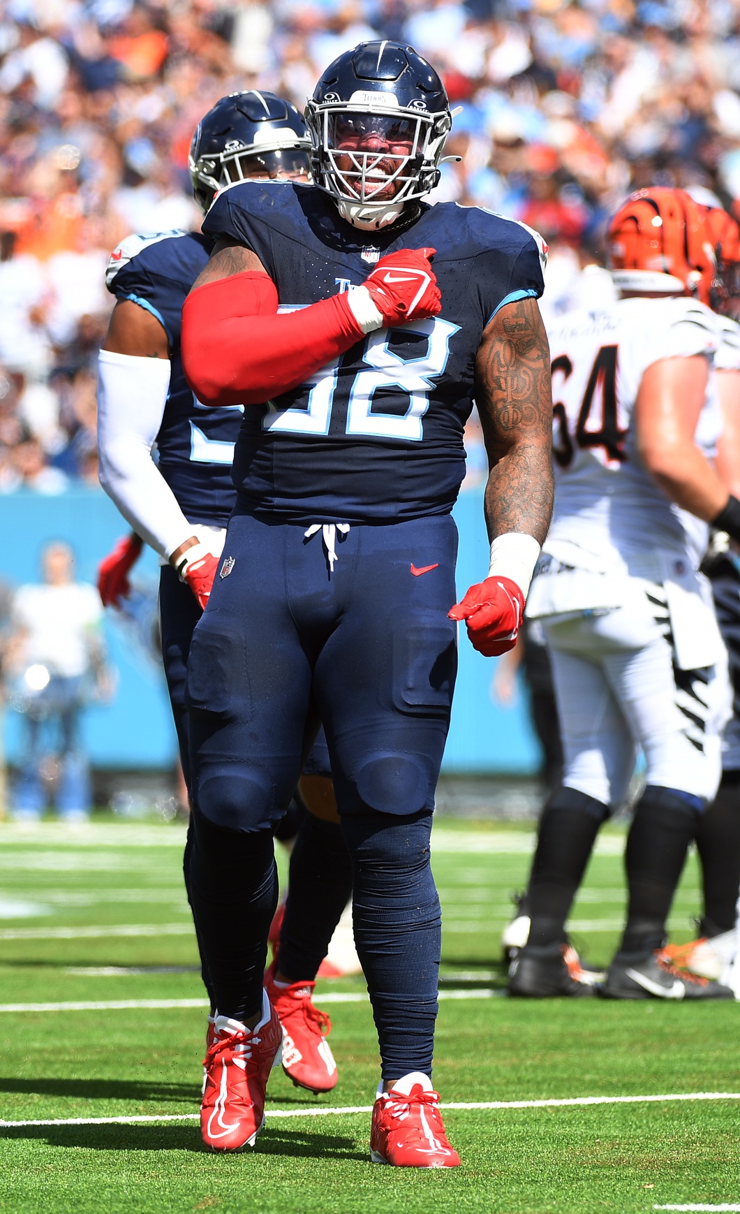 Tennessee Titans defensive tackle Jeffery Simmons (98) celebrates after a sack during the first half against the Cincinnati Bengals.