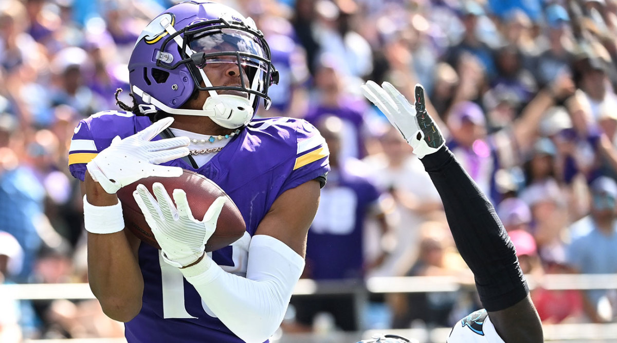 A tight shot of Justin Jefferson hauling in a touchdown catch