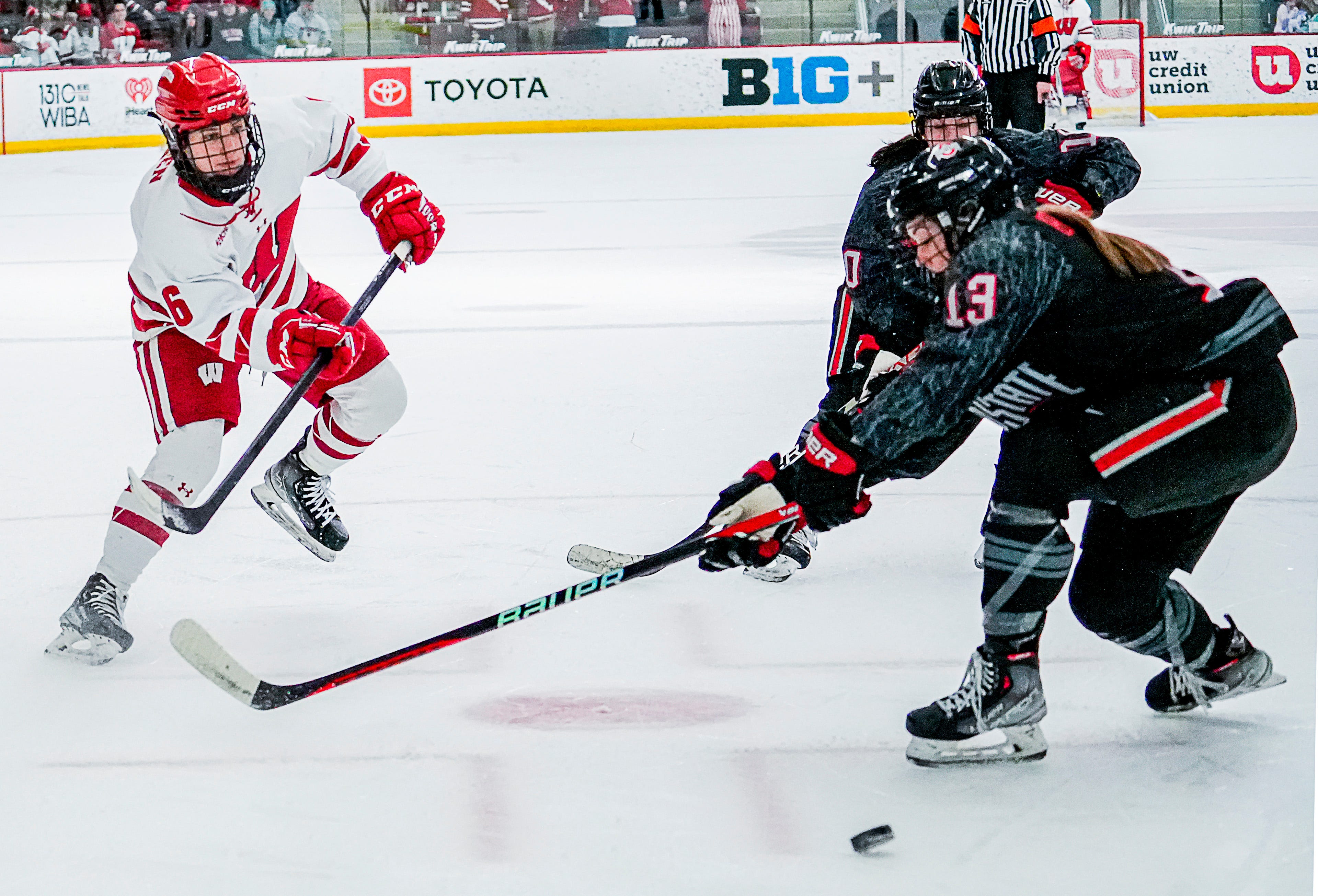 Wisconsin forward Lacey Eden (6) sends a shot toward the goal during the first period of a game against Ohio State on Saturday February 18, 2023 at LaBahn Arena in Madison, Wis.