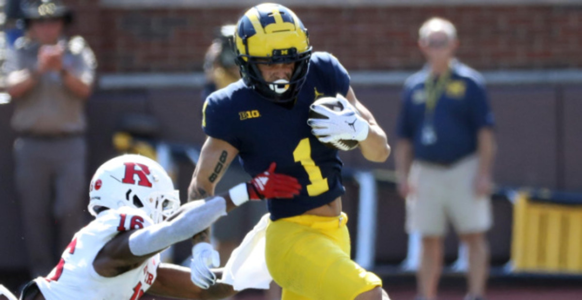 Michigan Wolverines wide receiver Roman Wilson catches a pass during a college football game in the Big Ten.