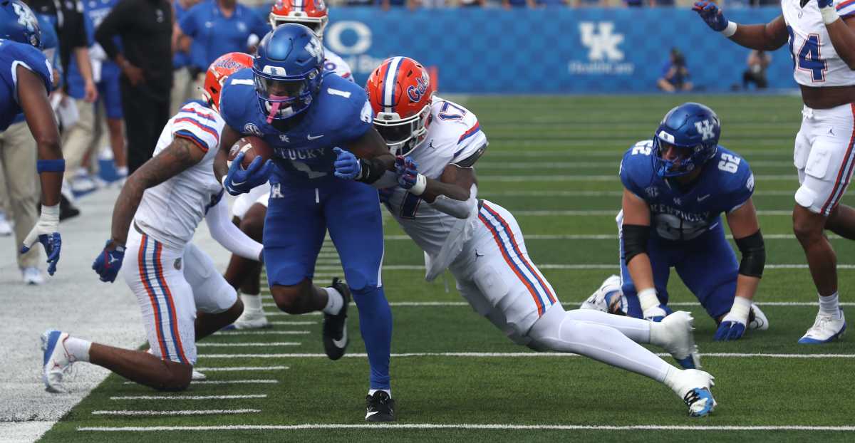 Kentucky running back Ray Davis powers through the Florida defense.