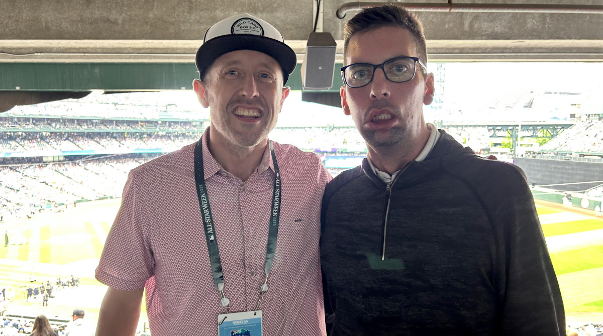 Sports Illustrated writer poses with friend and Flames exec Chris Snow at the 2023 MLB All-Star Game.