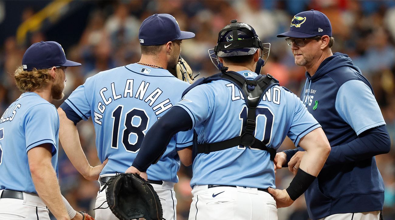 Rays pitching coach Kyle Snyder makes a mound visit.