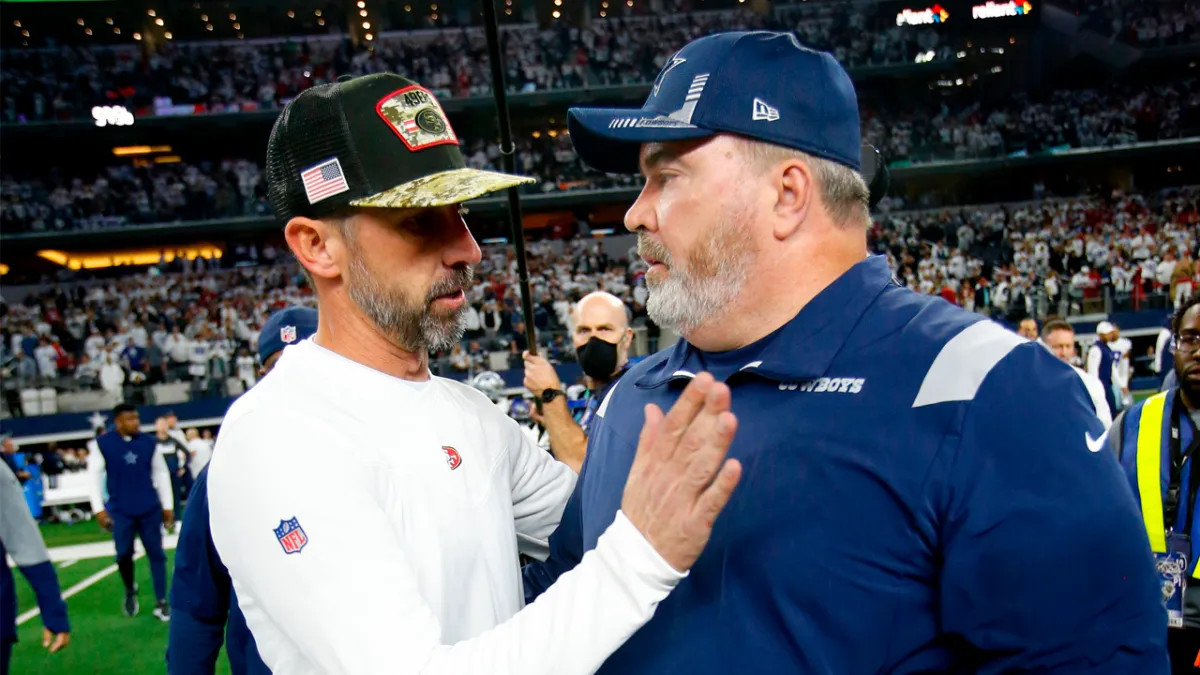 San Francisco's Kyle Shanahan with Dallas Cowboys head coach Mike McCarthy.