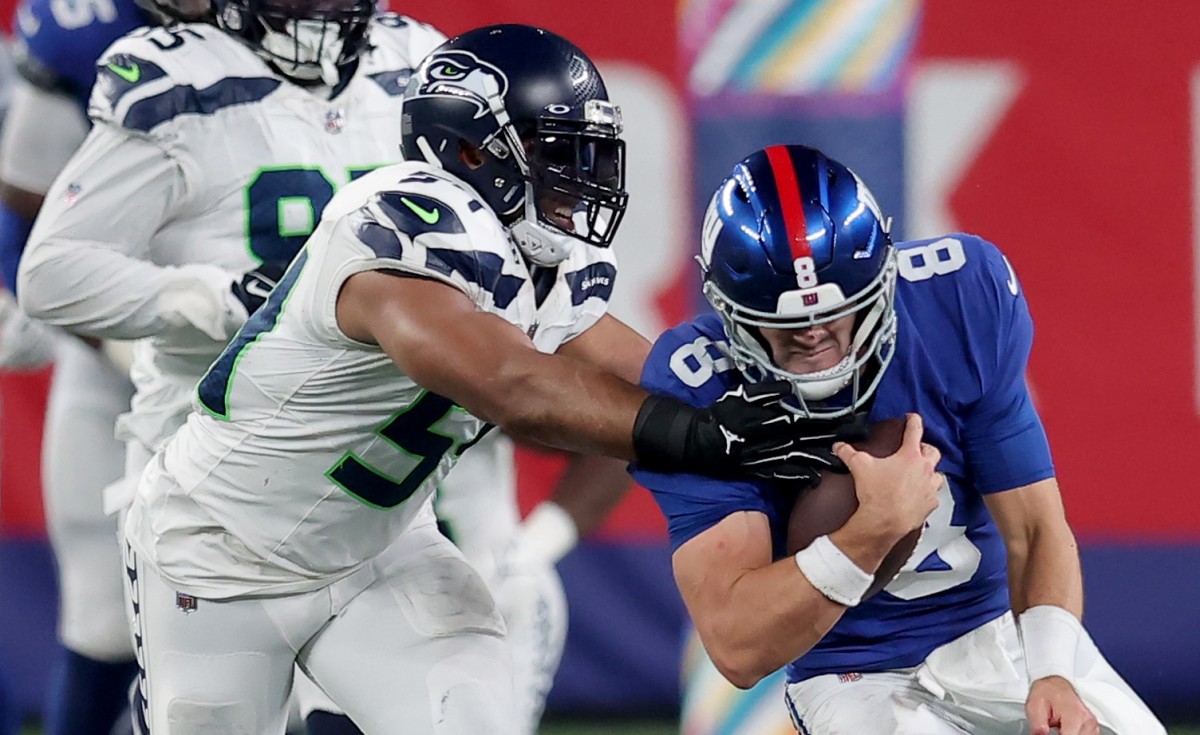 New York Giants quarterback Daniel Jones (8) is tackled by Seattle Seahawks linebacker Bobby Wagner (54) during the fourth quarter at MetLife Stadium.