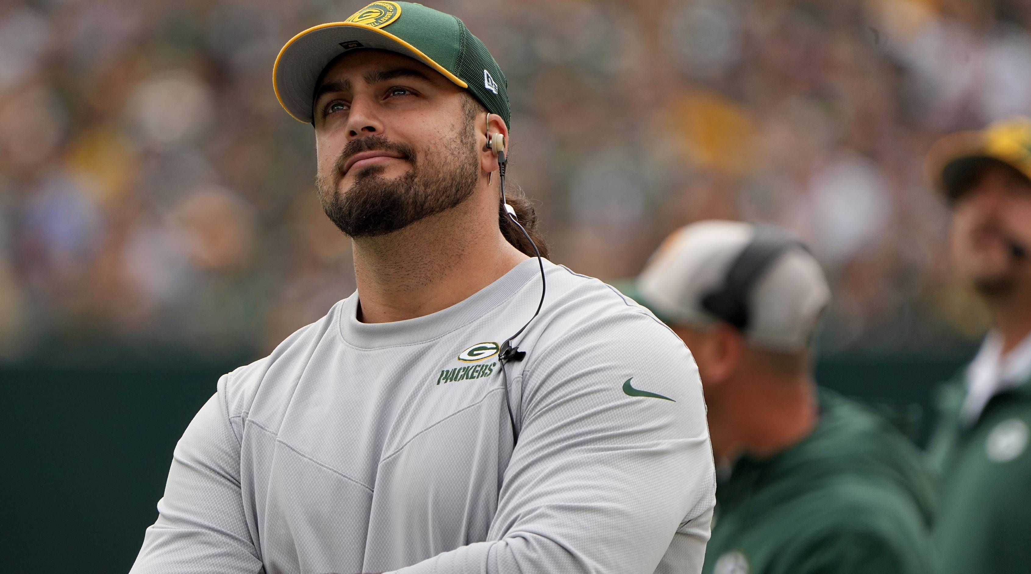 Packers offensive tackle David Bakhtiari looks on while inactive during a game.