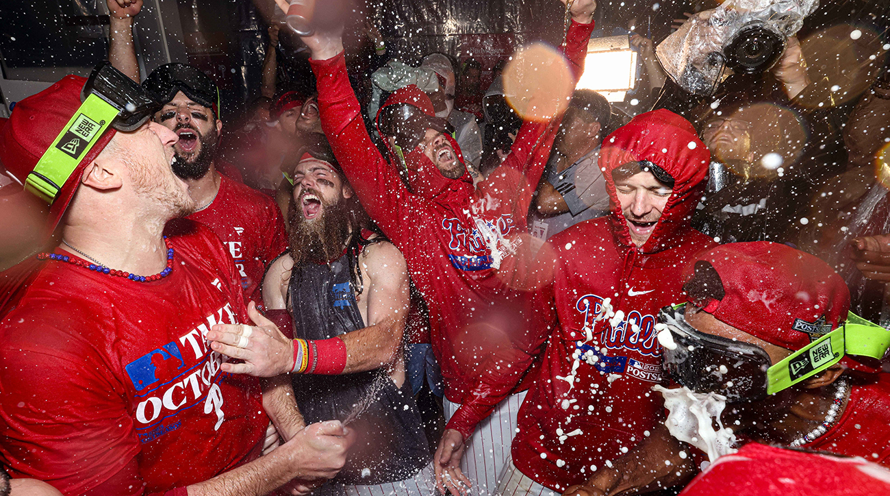 Phillies celebrate wild card series win over Marlins.