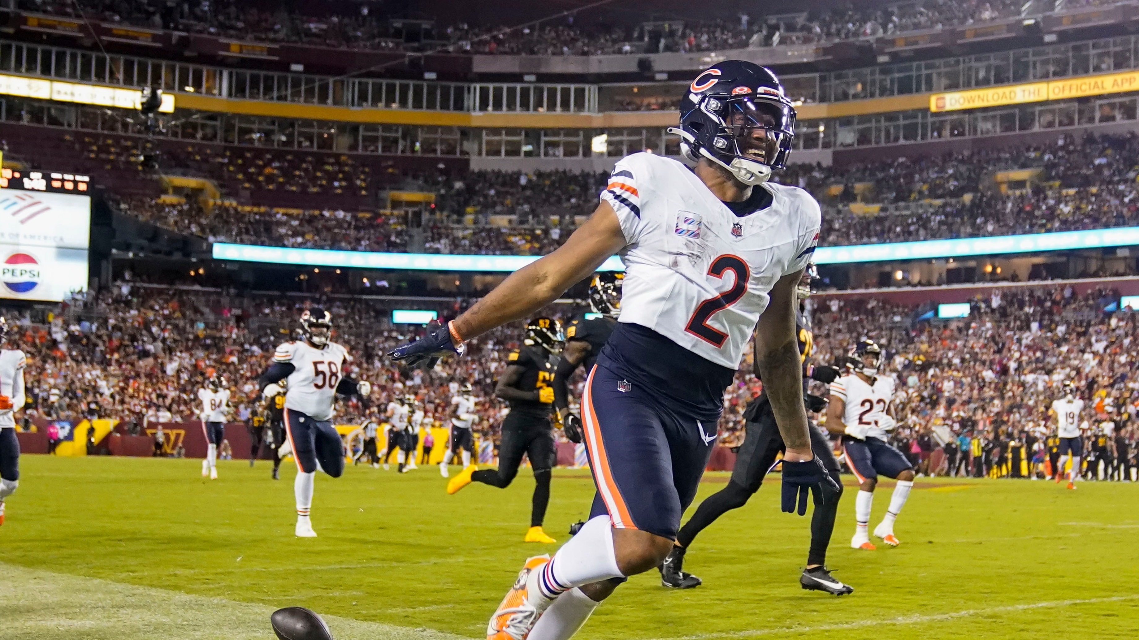 Bears wide receiver DJ Moore caught three touchdowns in Thursday’s win over the Commanders.