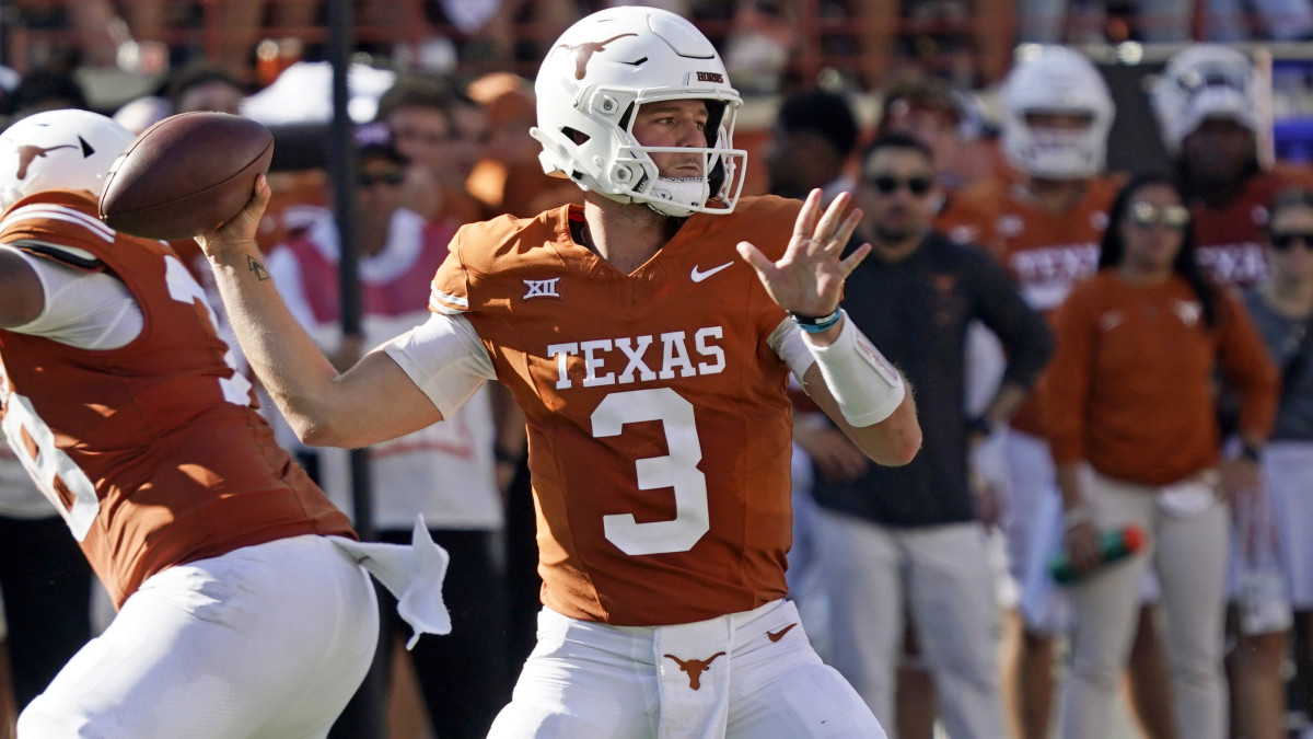 Texas quarterback Quinn Ewers throws a pass