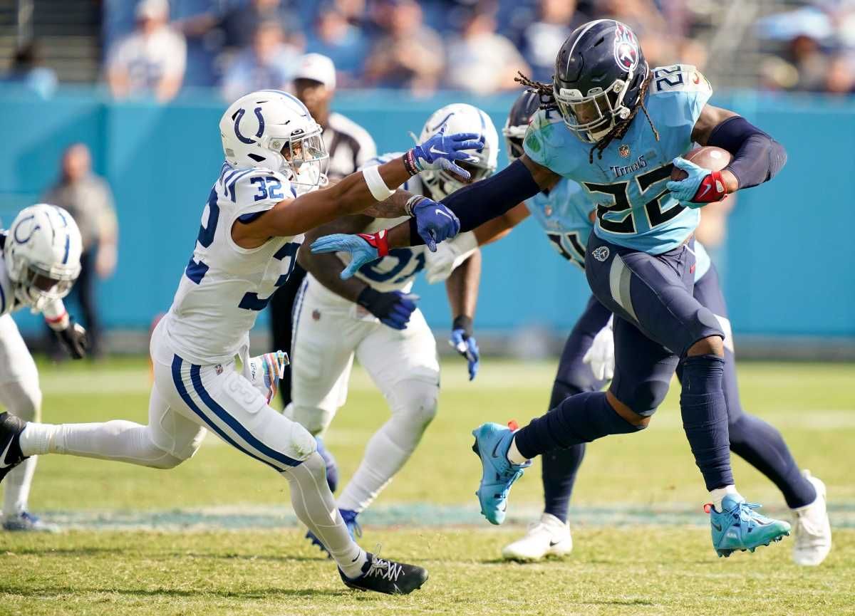 Tennessee Titans running back Derrick Henry (22) runs past Indianapolis Colts safety Julian Blackmon (32) during the fourth quarter at Nissan Stadium Sunday, Oct. 23, 2022, in Nashville, Tenn. Nfl Indianapolis Colts At Tennessee Titans