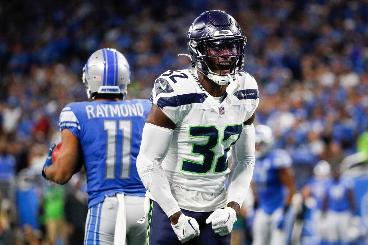 Seattle Seahawks safety Jerrick Reed II (32) celebrates a play against Detroit Lions during the first half at Ford Field in Detroit on Sunday, Sept. 17, 2023.