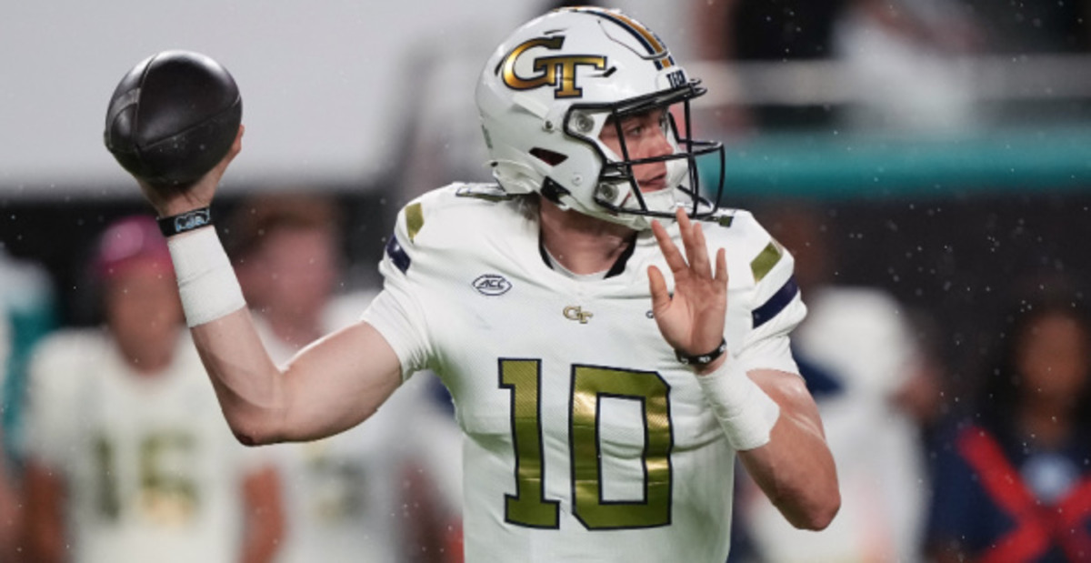 Georgia Tech Yellow Jackets quarterback Haynes King attempts a pass during a college football game in the ACC.