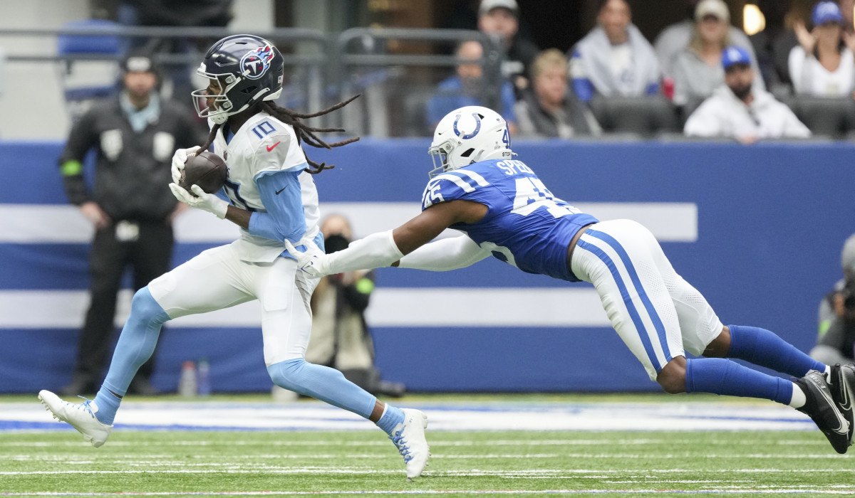 Oct 8, 2023; Indianapolis, Indiana, USA; Indianapolis Colts linebacker E.J. Speed (45) dives after Tennessee Titans wide receiver DeAndre Hopkins (10) as he rushes the ball in the game Lucas Oil Stadium at Lucas Oil Stadium.