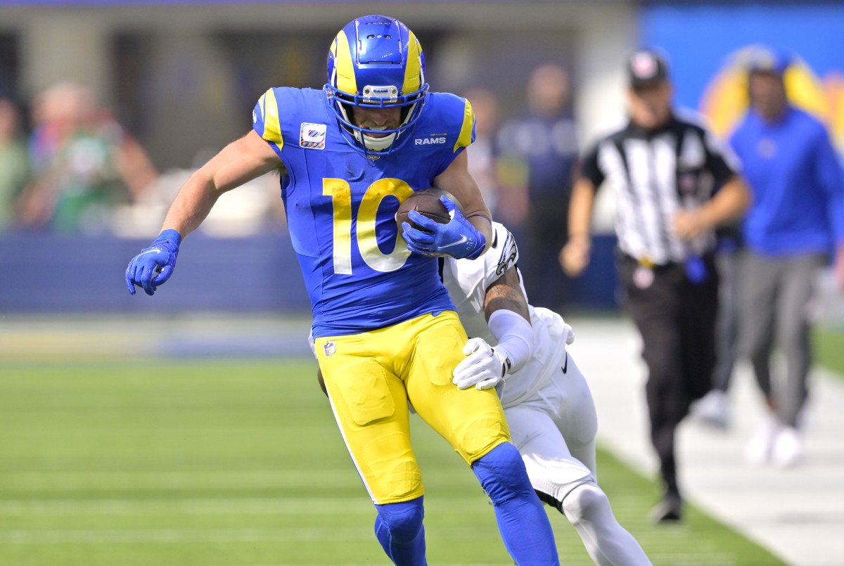 Oct 8, 2023; Inglewood, California, USA; Los Angeles Rams wide receiver Cooper Kupp (10) runs for a first down before he is stopped by Philadelphia Eagles cornerback Darius Slay (2) in the first half at SoFi Stadium.