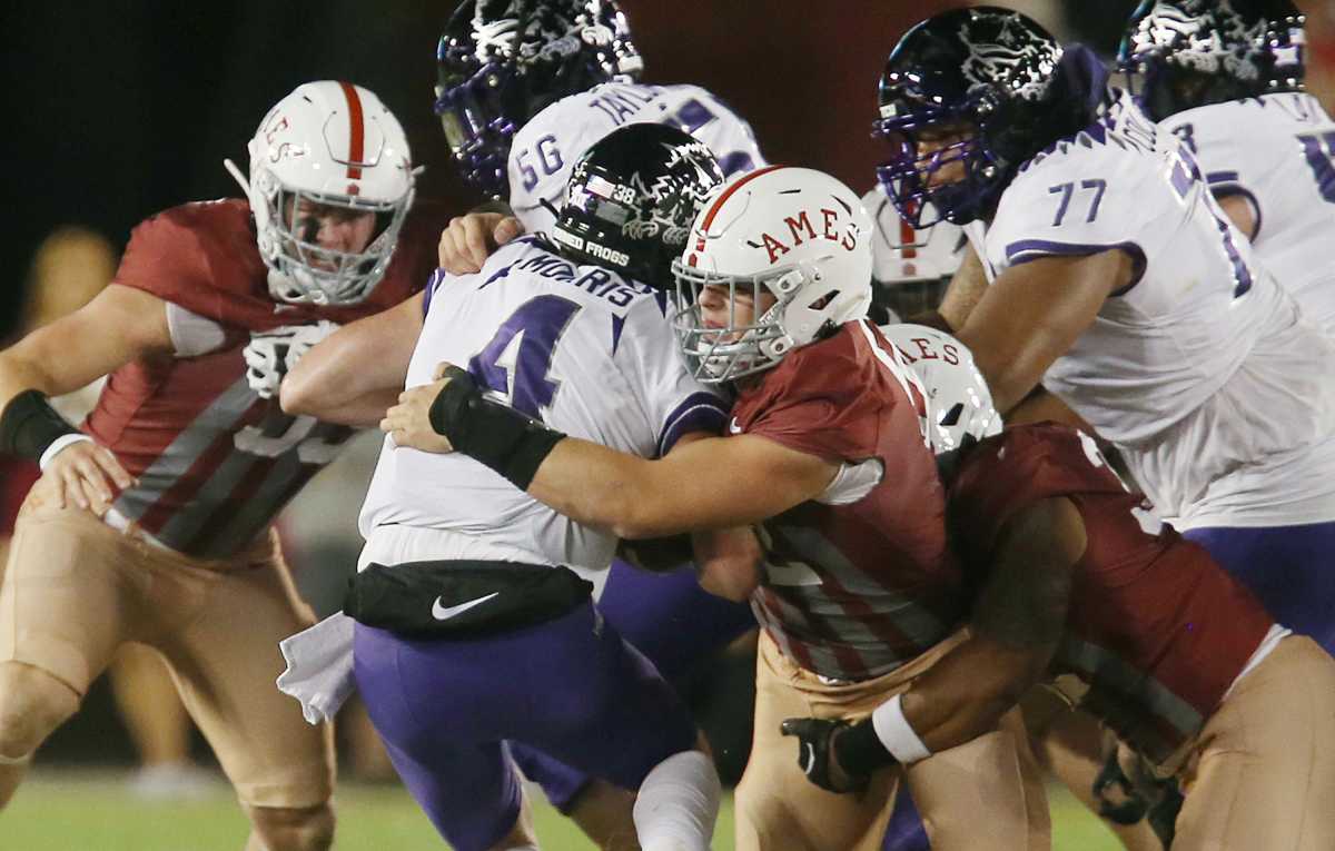 Iowa State Cyclones defensive end Joey Petersen (52) takes down TCU Horned Frogs' quarterback Chandler Morris (4) during the first half in the Jack Trice Legacy Game at Jack Trice Stadium on Saturday, Oct. 7, 2023, in Ames, Iowa.