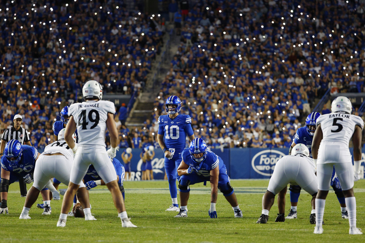 Sep 29, 2023; Provo, Utah, USA; Brigham Young Cougars quarterback Kedon Slovis (10) lines up at scrimmage against the Cincinnati Bearcats at LaVell Edwards Stadium. Mandatory Credit: Jeff Swinger-USA TODAY Sports