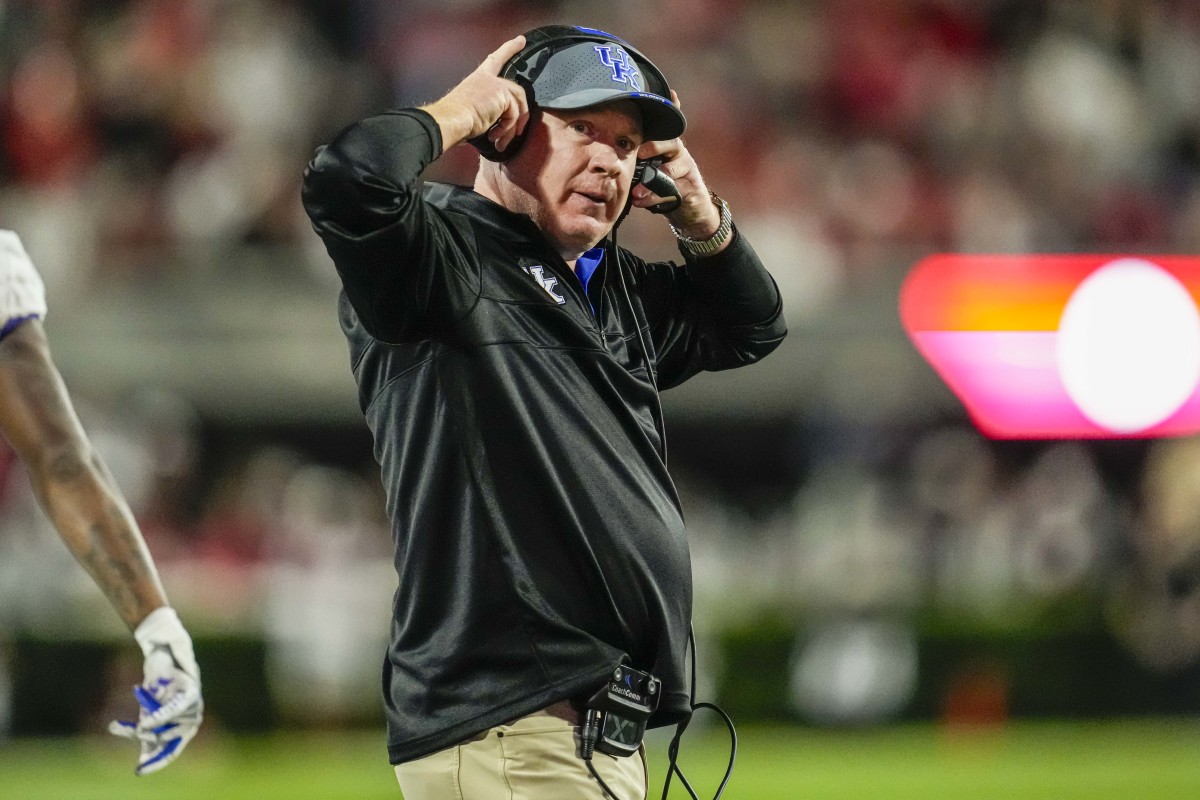 Kentucky Head Coach Mark Stoops walks on the sideline during his team's game against No.1 Georgia in Sanford Stadium.
