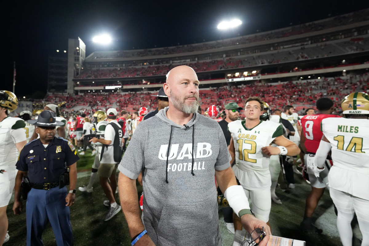 Sep 23, 2023; Athens, Georgia, USA; UAB Blazers coach Trent Dilfer leaves the field after the game against the Georgia Bulldogs in the second half at Sanford Stadium. Mandatory Credit: Kirby Lee-USA TODAY Sports