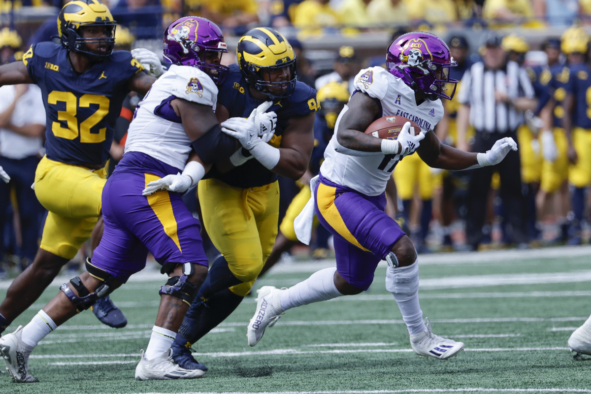 Sep 2, 2023; Ann Arbor, Michigan, USA; East Carolina Pirates running back Rahjai Harris (47) rushes in the second half against the Michigan Wolverines at Michigan Stadium. Mandatory Credit: Rick Osentoski-USA TODAY Sports