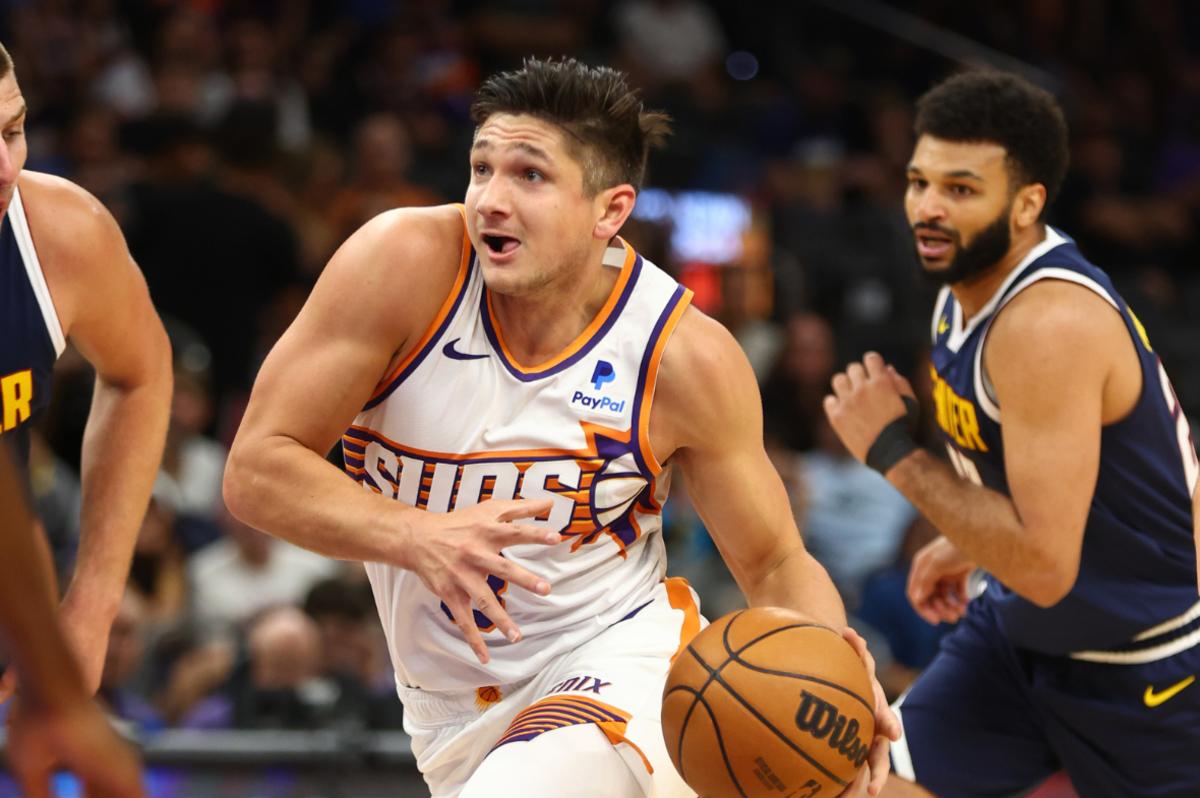 Phoenix Suns guard Grayson Allen against the Denver Nuggets during a preseason game at Footprint Center.