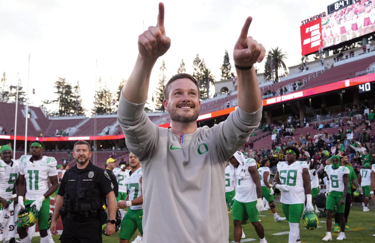 Oregon Ducks head coach Dan Lanning celebrates after a win