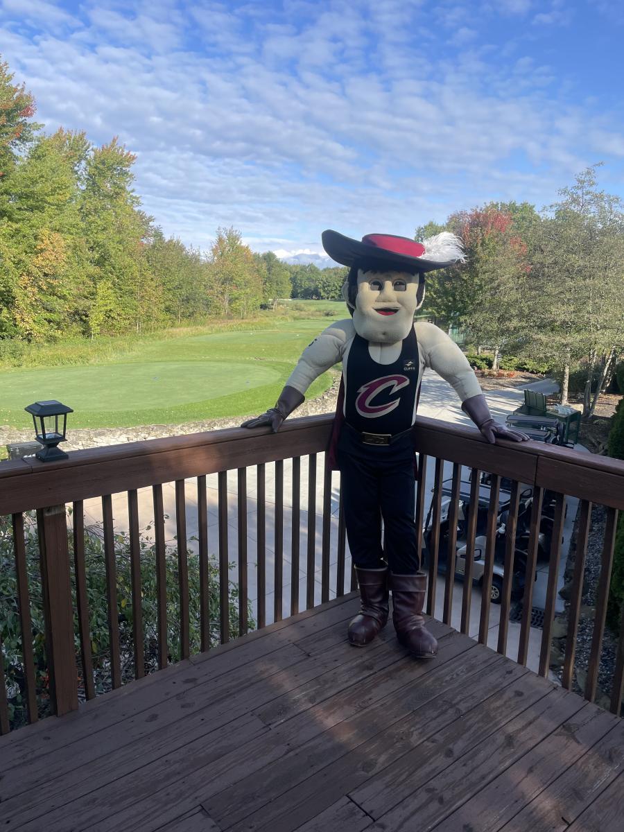Oct. 9, 2023: Cavs mascot Sir CC enjoys the view from the porch at Red Tail Golf Club.