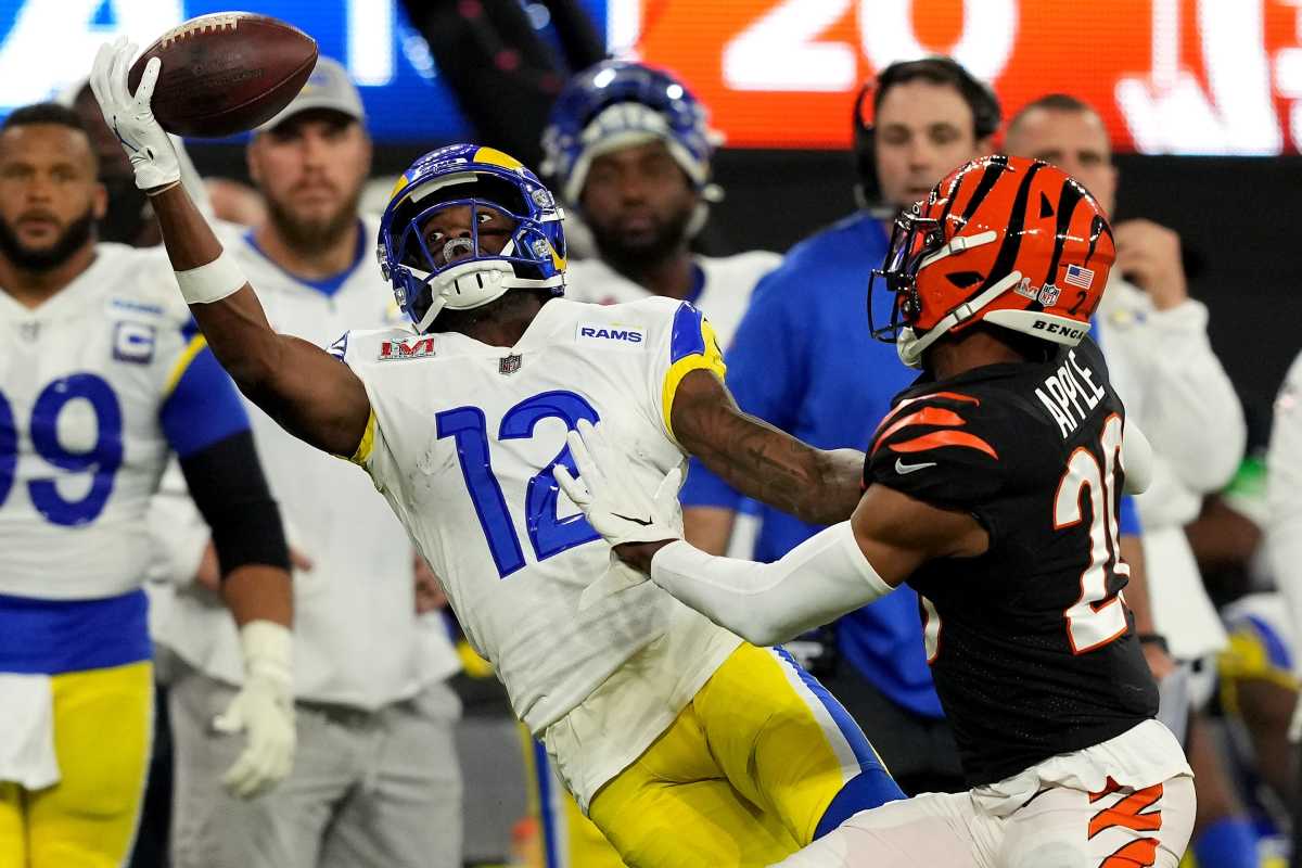 Los Angeles Rams wide receiver Van Jefferson (12) stretches for a deep pass as Cincinnati Bengals cornerback Eli Apple (20) defends in the fourth quarter during Super Bowl 56, Sunday, Feb. 13, 2022, at SoFi Stadium in Inglewood, Calif.