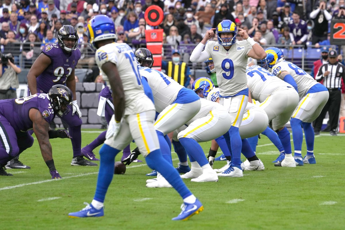 Jan 2, 2022; Baltimore, Maryland, USA; Los Angeles Rams quarterback Matthew Stafford (9) signals to wide receiver Van Jefferson (12) in the fourth quarter against the Baltimore Ravens at M&T Bank Stadium. Mandatory Credit: Mitch Stringer-USA TODAY Sports