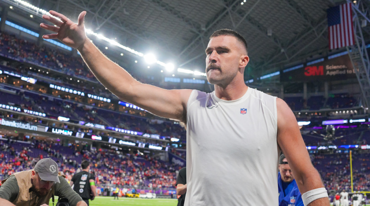 Chiefs tight end Travis Kelce leaves the field with his pads off after a game at the Vikings.