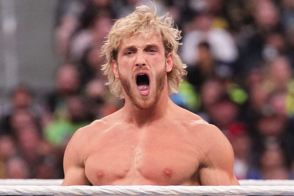 Logan Paul gets fired up during his WrestleMania 39 match against Seth Rollins in a WWE ring.