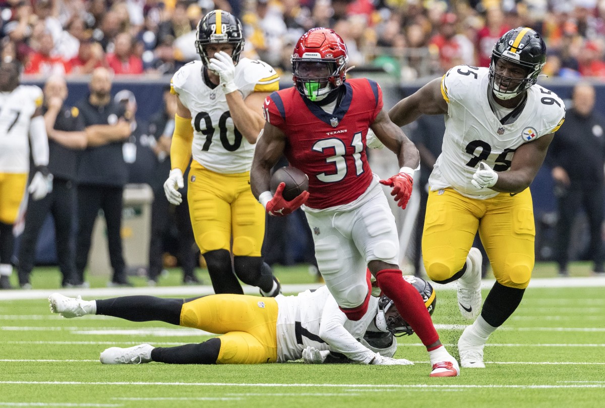 Oct 1, 2023; Houston Texans running back Dameon Pierce (31) rushes for a first down against the Pittsburgh Steelers. Mandatory Credit: Thomas Shea-USA TODAY Sports