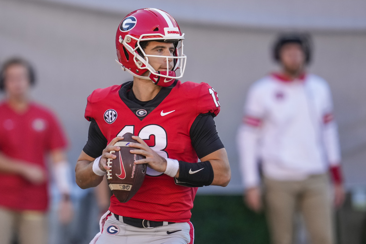 thens, Georgia, USA; Georgia Bulldogs quarterback Stetson Bennett (13) looks downfield against the Kentucky Wildcats during the first half at Sanford Stadium. Mandatory Credit: Dale Zanine-USA TODAY Sports