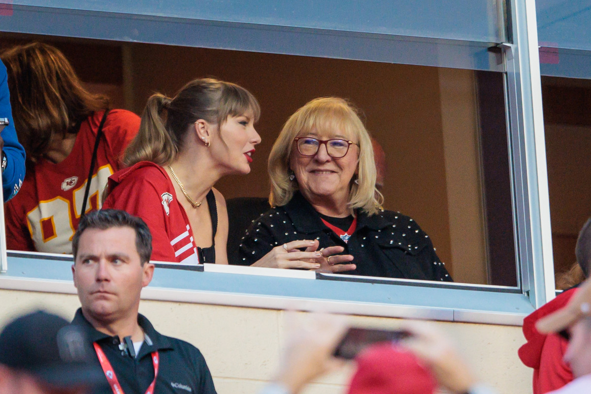Grammy award winning artist Taylor Swift watches Kansas City Chiefs take the field along with Kansas City Chiefs tight end Travis Kelce (87) mom Donna Kelce prior to the game against the Denver Broncos at Arrowhead Stadium. Mandatory Credit: