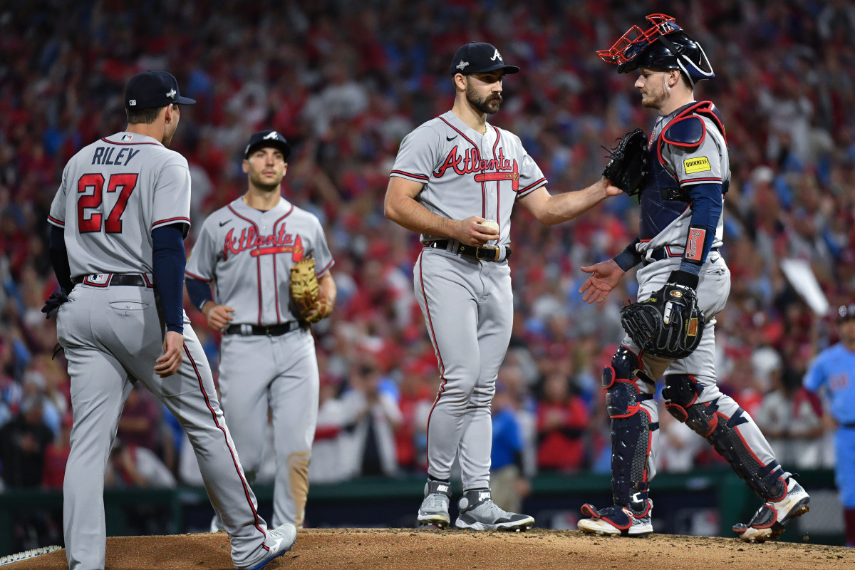 Oct 12, 2023; Philadelphia, Pennsylvania, USA; Atlanta Braves starting pitcher Spencer Strider (99) meets with catcher Sean Murphy (12) during the sixth inning during game four of the NLDS for the 2023 MLB playoffs at Citizens Bank Park.