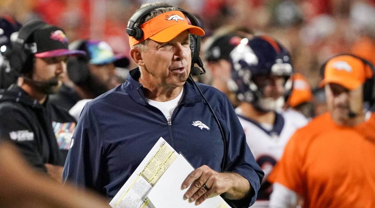 Broncos head coach Sean Payton looks on while coaching in a game.